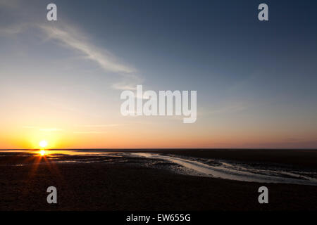 Tramonto a Wells-next-il-mare spiaggia, NORFOLK REGNO UNITO Foto Stock