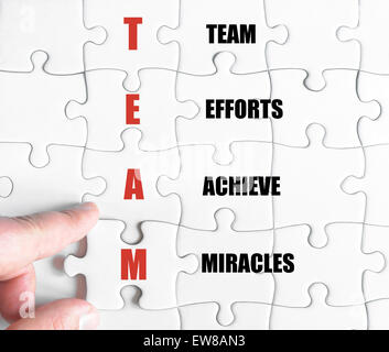 Concetto di immagine del Business Team acronimo come gli sforzi del team fare dei miracoli Foto Stock