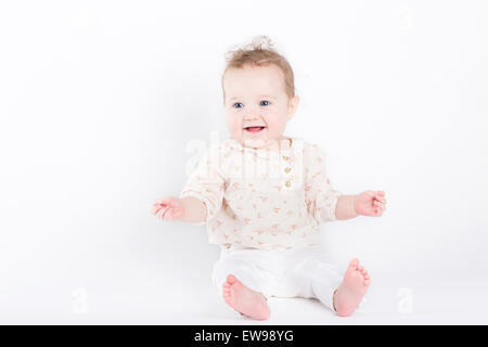 Ritratto di un carino ed elegante Baby girl Foto Stock