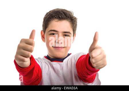 Un simpatico ragazzo ispanica con la pelle morbida rende Thumbs up, utilizzando entrambe le mani. Foto Stock