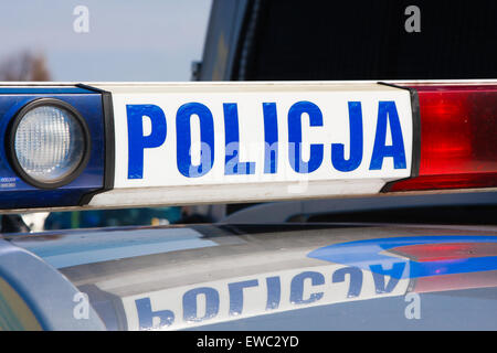 LIPNICA MUROWANA, Polonia - 29 Marzo: Pasqua Palm concorso annuale di Lipnica Murowana. Polizia Polacca sign su un tetto di auto della polizia o Foto Stock