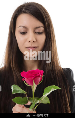 Giovane donna tenendo un mazzo di rose Foto Stock