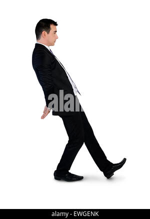 Isolate il business man spingendo qualcosa Foto Stock