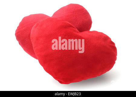 Due cuore rosso cuscini su sfondo bianco Foto Stock