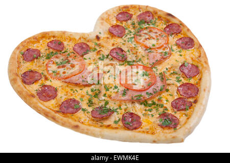 A forma di cuore sulla pasta vecchio tavolo in legno Foto stock - Alamy