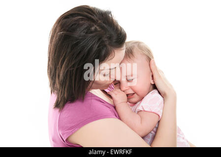 Madre cercando di calmare il suo pianto baby Foto Stock