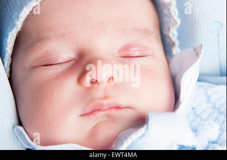 Face close up di un neonato Foto Stock