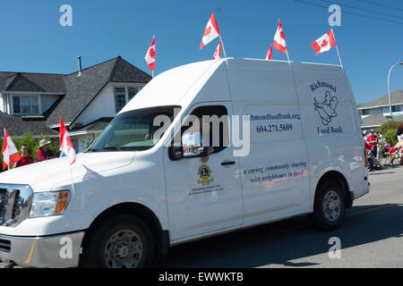 Vancouver, Canada. 1 Luglio, 2015. Divertimento per tutta la famiglia al settantesimo Steveston annuale Festival di salmone apporta famiglie provenienti da tutta la zona di Vancouver di Steveston. Questo avviene anche per essere il Canada giorno , della Columbia britannica in Canada il 1 luglio 2015 . Fotografo Frank Pali / Alamy Live News Foto Stock