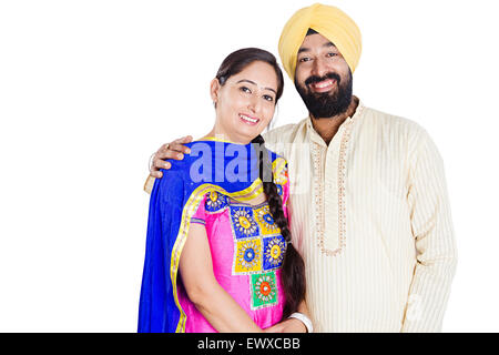 2 indian Punjabi coppia sposata si pongono permanente Foto Stock