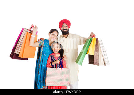 Indian Punjabi genitori e figlia shopping bag mostra Foto Stock