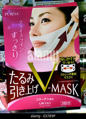 Maschera per il viso cura femmina prodotti di bellezza Hong Kong pubblicità cinese Cina Foto Stock