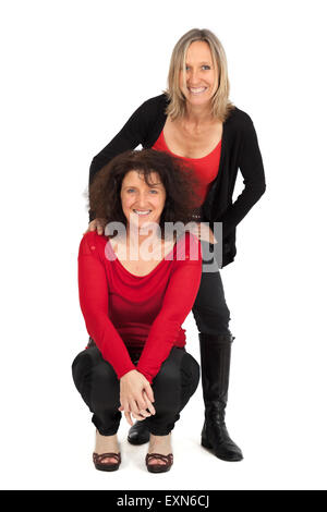 Belle Donne facendo espressioni diverse in diversi set di vestiti: posa Foto Stock