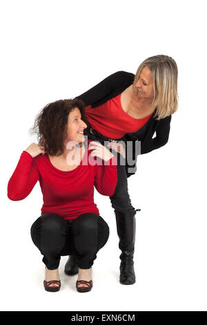 Belle Donne facendo espressioni diverse in diversi set di vestiti: posa Foto Stock