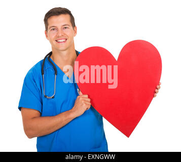 Felice infermiere azienda forma di cuore su sfondo bianco Foto Stock