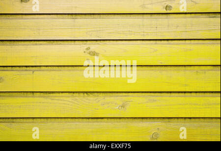 Vecchio sfondo di legno dipinte di giallo Foto Stock
