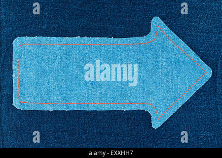 Puntatore realizzato in tessuto denim con cuciture gialle su denim, con spazio per il testo Foto Stock
