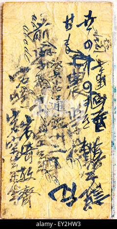 Retro di copertina di una mappa con annotazioni di Edo, Tokyo dal 1882. Di colore marrone con coperchio nero script kanji. Foto Stock