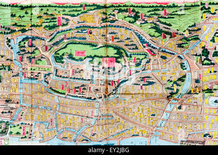 1882 stilizzato colore topografica Mappa di Tokyo, Edo. Dettaglio che mostra una parte della mappa della città con vari quartieri, punti di riferimento marcato con un piccolo banner. Foto Stock