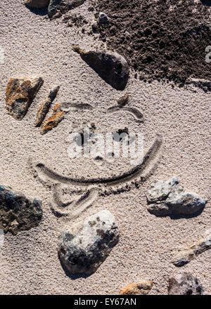 Smile nella sabbia Foto Stock