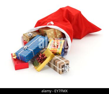 Un sacco di coloratissimi regali di Natale versando da Santa in borsa Foto Stock