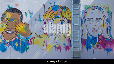 Barack Obama, Angela Merkel , Vladimir Putin street arte murale su edificio Foto Stock