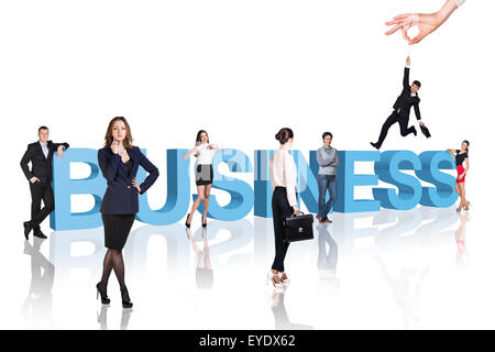 Business - professionisti soggiornare vicino al testo. Foto Stock