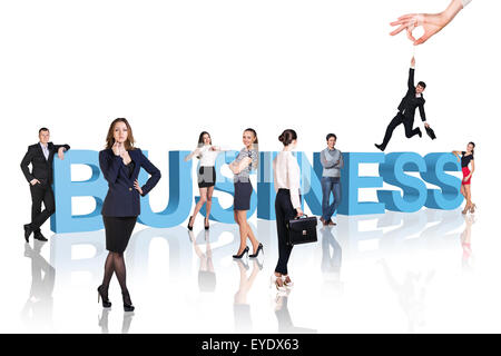 Business - professionisti soggiornare vicino al testo. Foto Stock