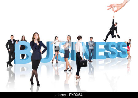 Business - professionisti soggiornare vicino al testo. Foto Stock