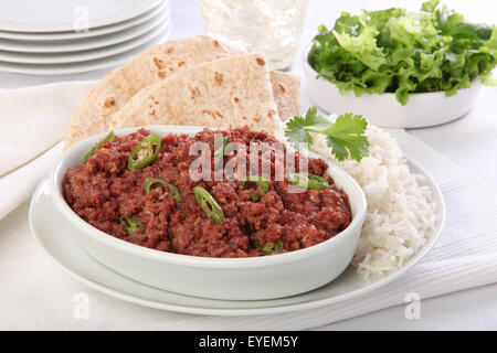 Paté di carne di montone cuocere con riso e CHAPATI Foto Stock