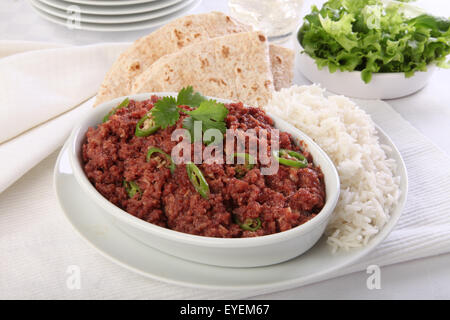 Paté di carne di montone cuocere con riso e CHAPATI Foto Stock