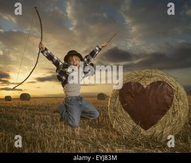 Fanciullo guerriero del cuore trova l'amore. Foto Stock