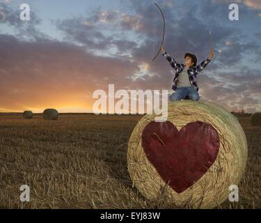 Fanciullo guerriero del cuore trova l'amore. Foto Stock