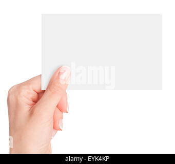 Le donne le dita tenendo un blank business card isolato su sfondo bianco Foto Stock