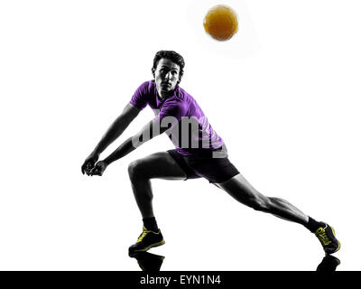 Young volley ball player uomo in silhouette sullo sfondo bianco Foto Stock