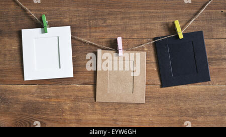 Photo Frame sullo sfondo di legno Foto Stock