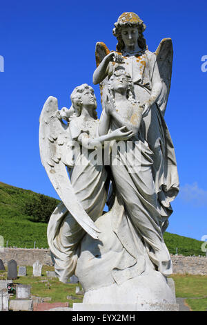 Angelic Headstone in St Tudno nel cimitero, Great Orme, Llandudno, Galles Foto Stock