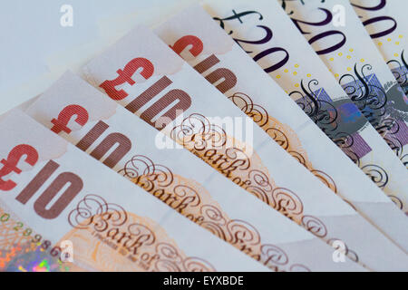 Sfondo di dieci e venti UK pound banconote (sterline) Foto Stock