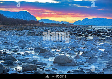 Notte polare a mezzogiorno, costa con ice floes, vista da Lang°ya Isola, Norvegia, VesterÕlen, Insel e°ya, Andenes Foto Stock