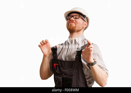 Molto orgoglioso uomo nel sito in costruzione i vestiti Foto Stock