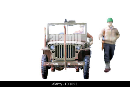 Soldati e Jeep modelli in plastica isolato su uno sfondo bianco Foto Stock
