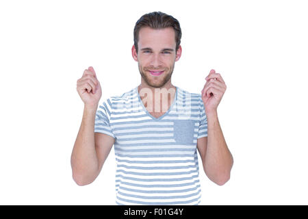 Felice uomo bello holding qualcosa Foto Stock