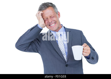 Imprenditore bere tazza di caffè Foto Stock