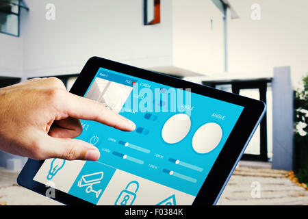 Immagine composita dell'uomo utilizzando tablet pc Foto Stock