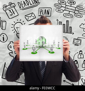 Immagine composita di imprenditore in possesso di una carta bianca davanti al suo volto Foto Stock