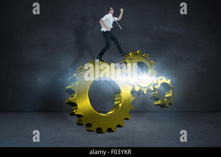 Immagine composita di geeky imprenditore in ritardo Foto Stock