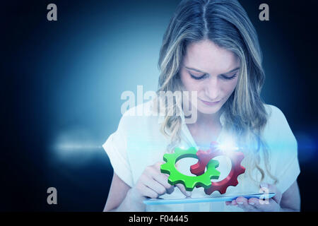 Immagine composita della donna utilizzando un tablet pc Foto Stock