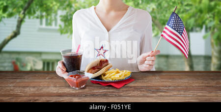 Donna celebrando American Independence Day Foto Stock