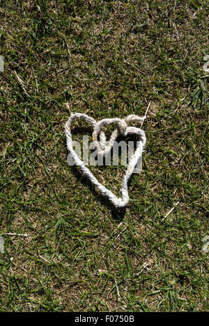 In Inghilterra. A forma di cuore da un pezzo di spago. Foto Stock