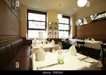 Le tabelle di cui al ristorante, Austria Foto Stock