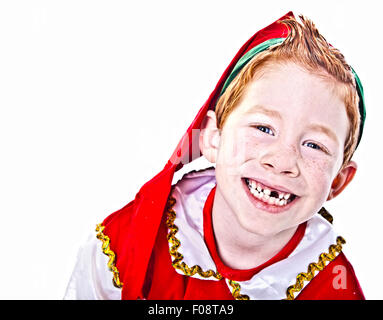 Carino ragazzo in un Natale costume Elf Foto Stock